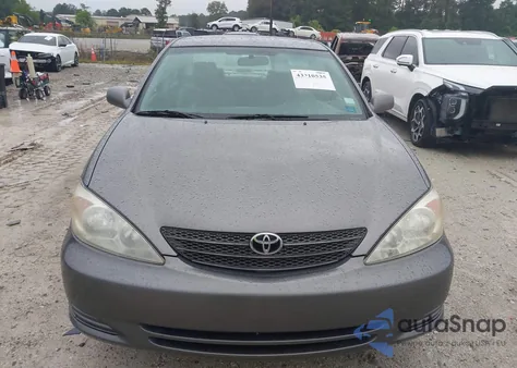 2003 Toyota Camry Le V6 z USA, uszkodzony, nr VIN 4T1BF32K73U547475